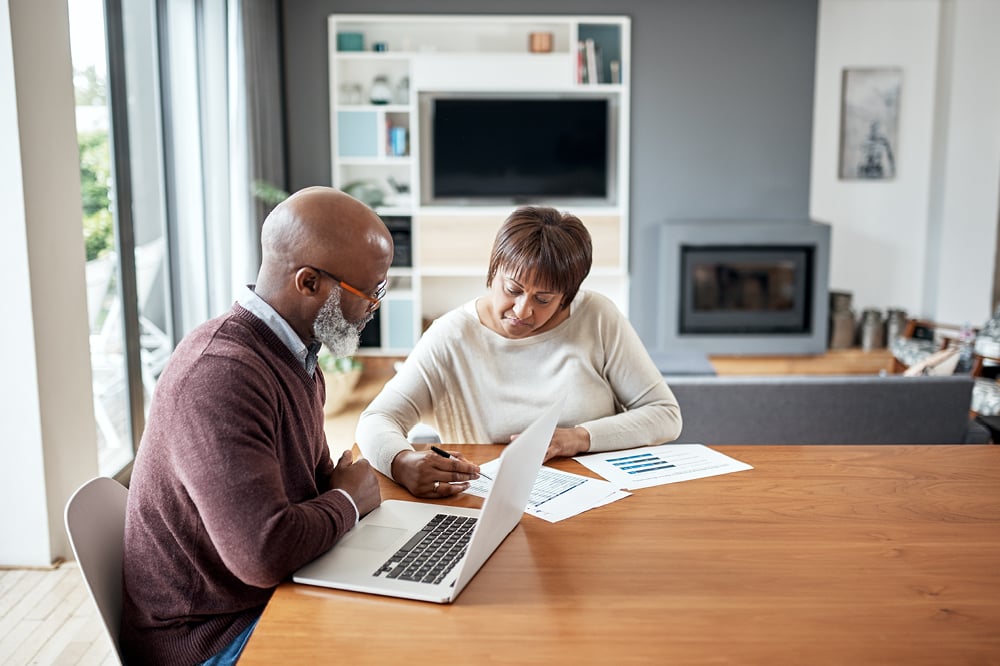 Couple looking at paperwork 